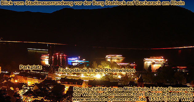 Wine festival summer night in August with firework display round boat trip Rhine river lights  with DJ music and dance to the wine festival summer night on the Middle Rhine River in Germany. 