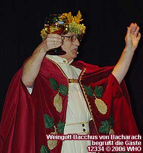 Wine God Bacchus from Bacharach welcomes the guests with maudlin words.